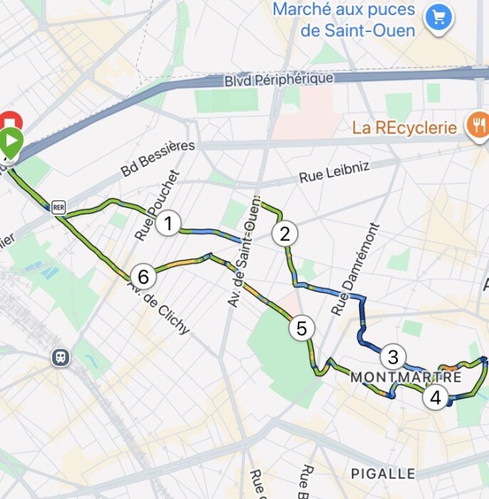 Karta över Montmartre-området i Paris med markerad rundvandring genom gator vid Saint-Ouen, Clichy och Montmartre med numrerade stopp.