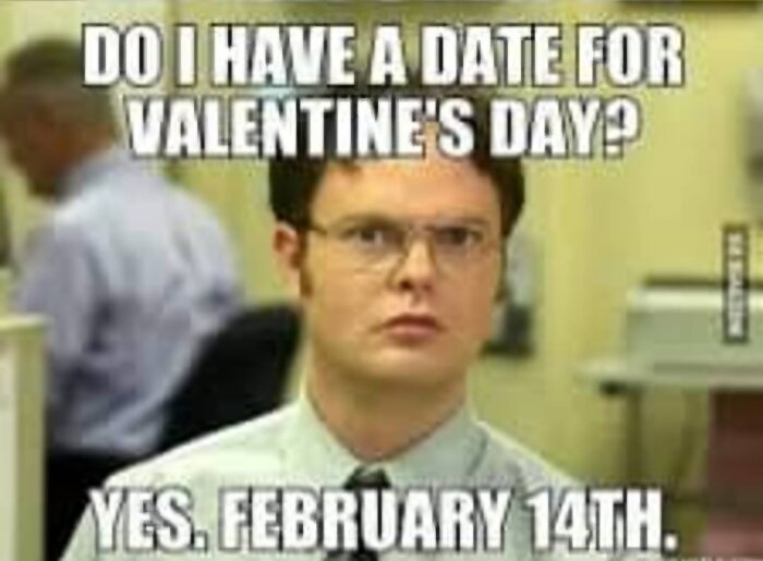 Kontorsmiljö med man i glasögon, text: "Do I have a date for Valentine's Day? Yes. February 14th." Humor om alla hjärtans dag.