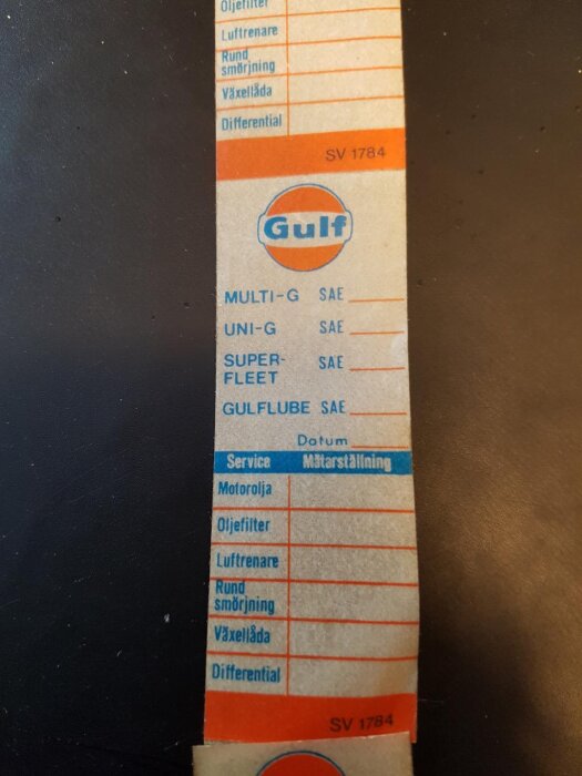 Etikett från Gulf för fordonsservice med fält för motorolja, oljefilter, luftfilter, smörjning, växellåda och differential.