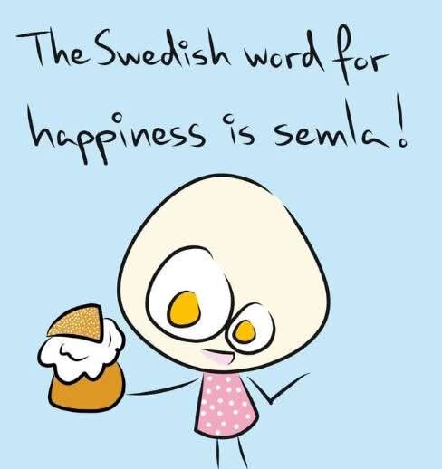 Tecknad figur med stor huvudform och prickigt plagg håller en semla. Text ovanför lyder: "The Swedish word for happiness is semla!