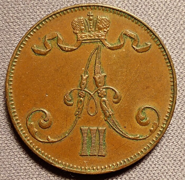Mynt från Finland, 5 penni 1892, med Tsar Alexander III:s emblem.