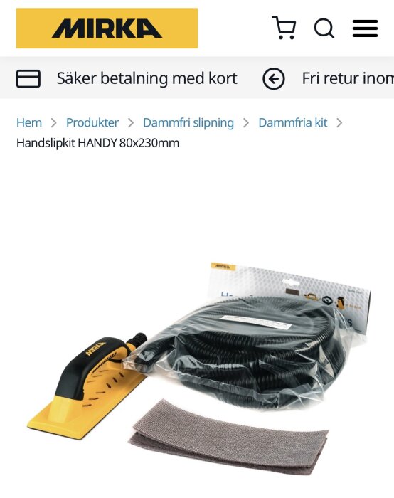 Mirka handslipkit 80x230mm med handtag, slang och slipmaterial ligger på ett bord. Kit för dammfri slipning.