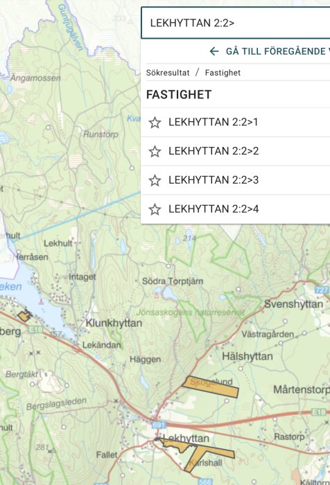 Karta över området runt Lekhyttan med en fastighetslista till höger, inklusive fastigheter Lekhyttan 2:2>1 till 2:2>4.