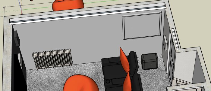 Hemmakontor med soffa, orange kuddar, ett element under fönstret och en elcentral bakom en lucka.