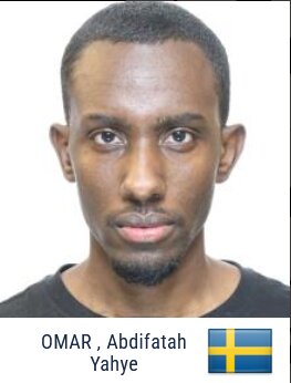 Man med kort hår och skägg, text nedanför visar namn och svensk flagga.