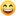 En leende smiley-emoticon med röda kinder och ihopknipna ögon.