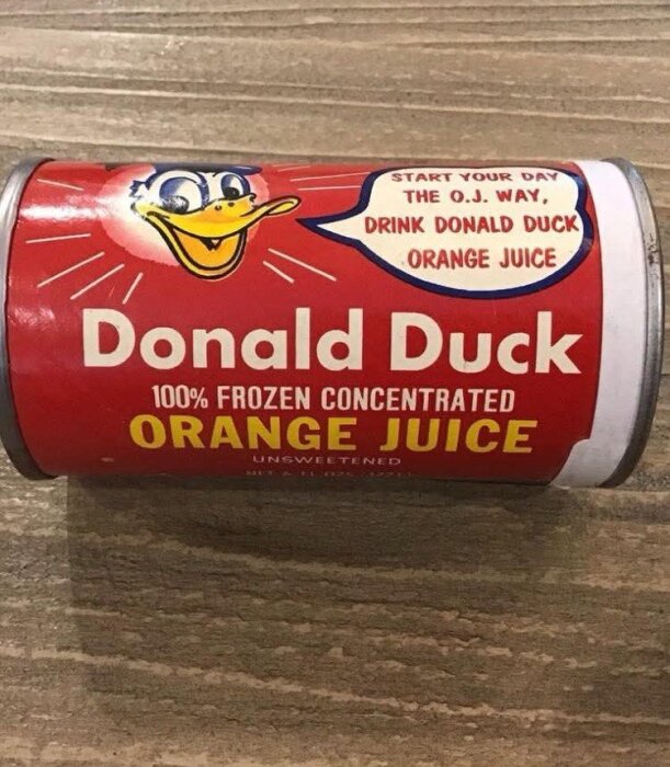 Donald Duck fryst koncentrerad apelsinjuice, röd burk med karaktären och texten "Start your day the O.J. way, drink Donald Duck orange juice".
