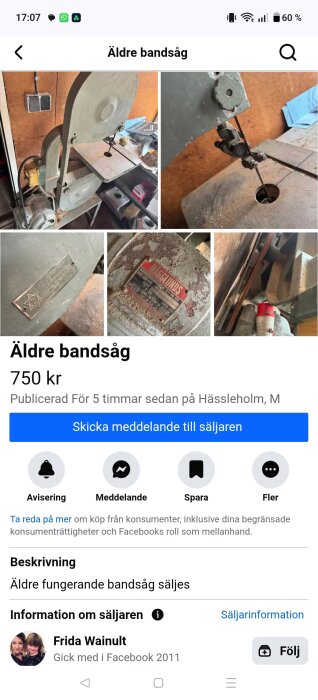 Äldre bandsåg med rost och slitage, märkt med informationstext. Säljs för 750 kr. Finns i en verkstad med hyllor och eluttag.