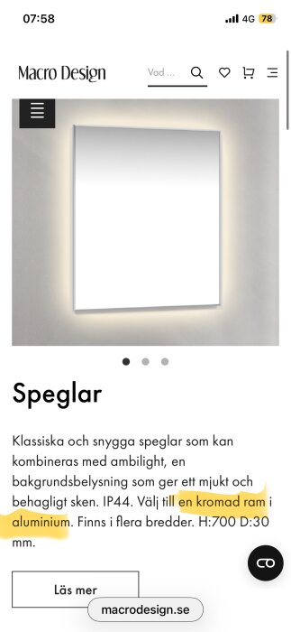 Spegel med kromad ram i aluminium och ambilight-bakgrundsbelysning från Macro Design, ger ett mjukt och behagligt sken.