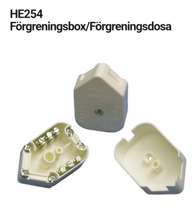 Förgreningsbox HE254 i vit plast, avsedd för koppling av sladdar. Boxen är isärplockad och visar insidan med skruvanslutningar.