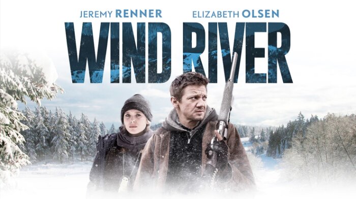 Filmplanschen för "Wind River" med snötäckt landskap och två personer i vinterkläder i förgrunden.