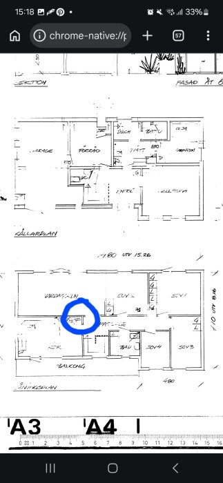 Planritning av hus med blå cirkel markerande en vägg på ca 1,4 m som planeras att rivas i vardagsrummet.