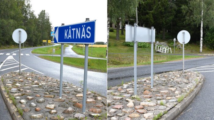 Vägskylt med texten "Kåtnäs" i en kurva, placerad på en stenlagd refug med träd och åkrar i bakgrunden.
