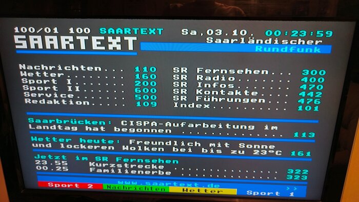 Text-tv sida från Saartext med rubriker som Nachrichten, Wetter, Sport I och Sport II. Datumet är 3 oktober, och klockan är 00:23:59.