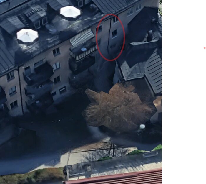 3D-bild av ett flerbostadshus med ett markerat hörn; område riskerar översvämning enligt karta.