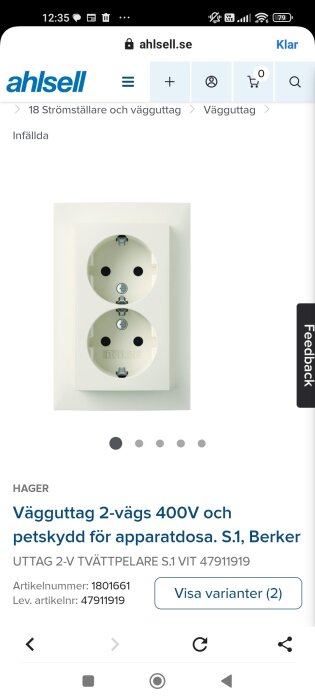 Dubbel vägguttag 400V med petskydd för apparatdosa, vit, märkt Berker. Röret används för byggprojekt och renovering.