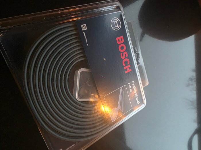 Förpackning av Bosch Professional FSN SS hållarkit, sett uppifrån.